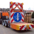 Sliding warning board is also possible to place on flatbed of truck